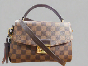 Croisette Handbag in Damier Ebene Canvas.